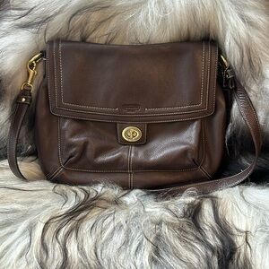 SOLD Vintage Coach Handbag. Chocolate brown. gently used. Turn to lock key